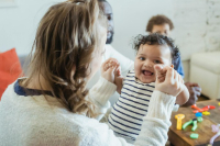 Smiling child at a Midland preschool enjoying playful learning in a safe, community-focused environment.