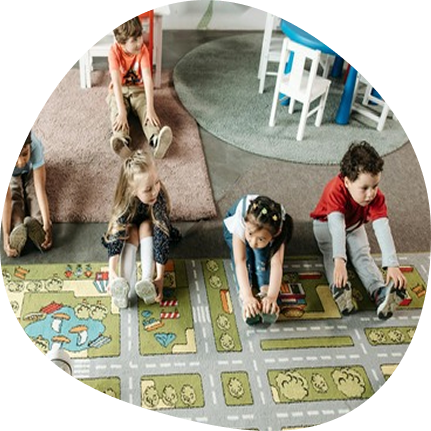 Children engaging in playful learning at Playful Scholars in Midland, blending creativity and academics.