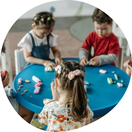 Children engaged in creative play at Playful Scholars in Midland, blending play with academics for growth.