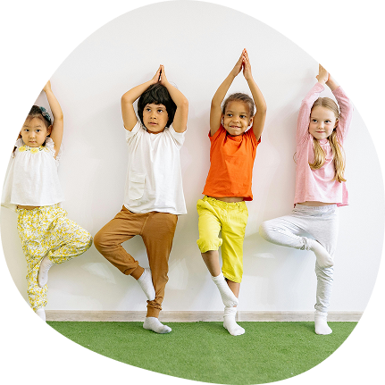 Children practicing yoga at Playful Scholars Pre-K in Midland MI, fostering creativity and confidence through play.