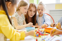 Children engaging in activities at Playful Scholars preschool in Midland, MI, fostering curiosity and community.