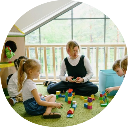 Children building blocks at Playful Scholars Pre-K in Midland MI, learning through play and creativity.