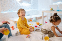 Children playing and learning at Playful Scholars, a modern preschool in Midland, MI.