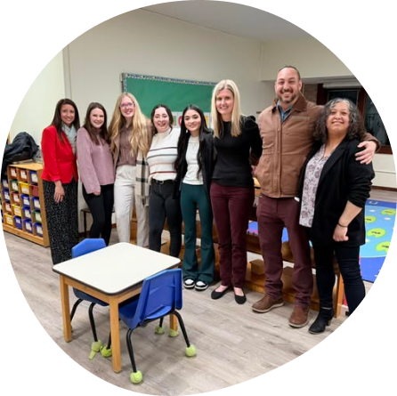Preschool staff at Playful Scholars in Midland, MI fostering a safe and curious learning community.