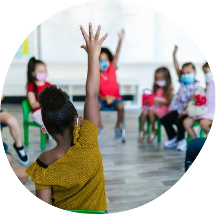 Toddlers learning at Playful Scholars in Midland, MI, sparking curiosity and independence in a joyful environment.