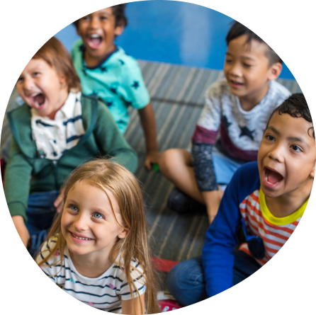 Happy toddlers at Playful Scholars in Midland sparking curiosity and joyful learning.